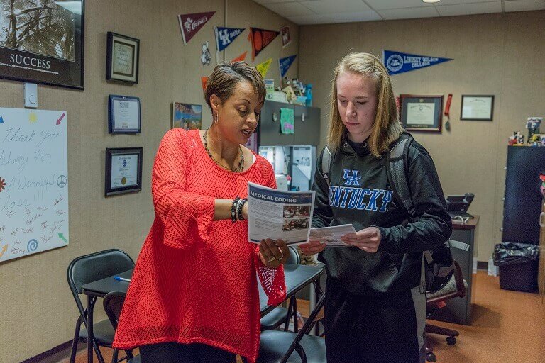 counselor talking to student in transfer office