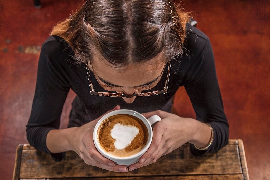 girl sipping coffee